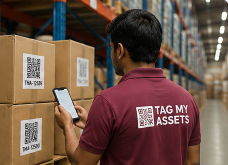 Tag My Assets auditor scanning QR code labels during warehouse inventory verification and asset audit
